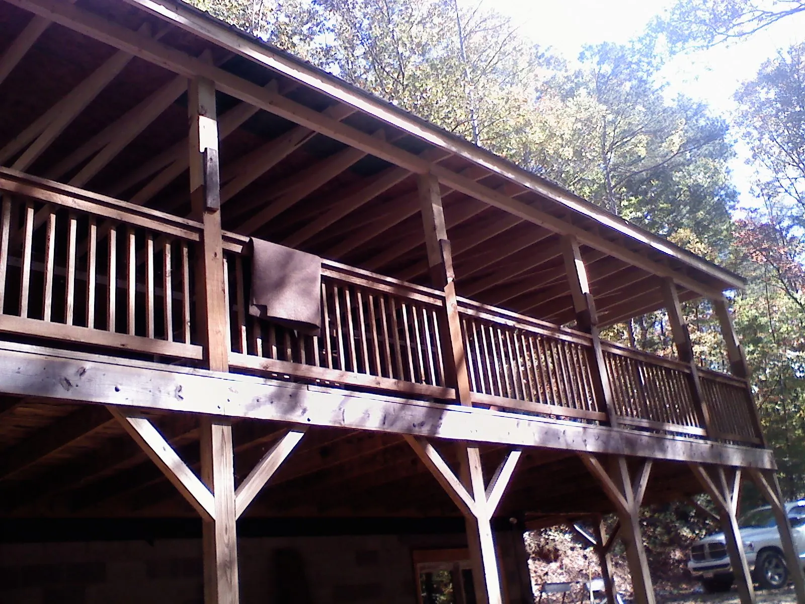 Timber framing under a new elevated porch and deck — Roof Leak Repair in Mcdonough by Roofing Brothers